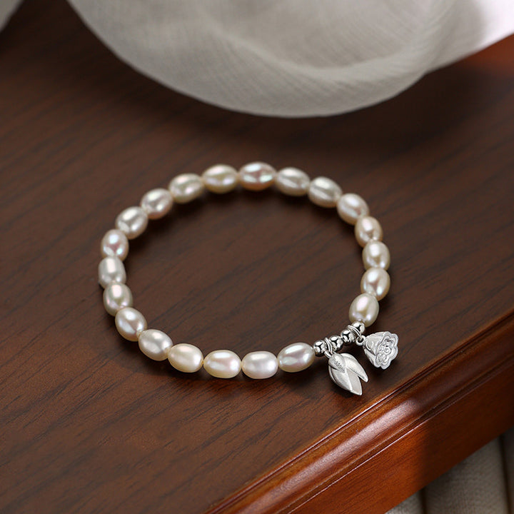 Pulsera curativa de perlas naturales con vaina de flor de loto de plata de ley 999 con Buddha Stones
