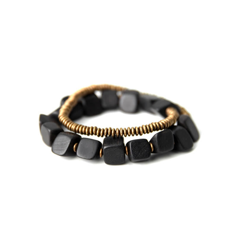 Pulsera de doble envoltura de paz de cobre y madera de ébano tibetano con Buddha Stones