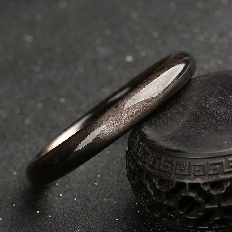 Brazalete de protección de obsidiana con brillo dorado y Buddha Stones