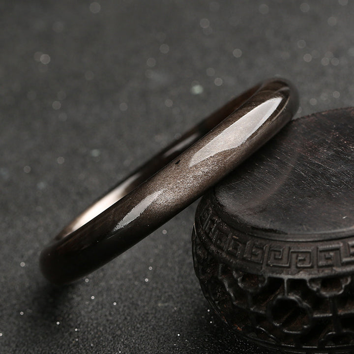 Brazalete de protección de obsidiana con brillo dorado y Buddha Stones