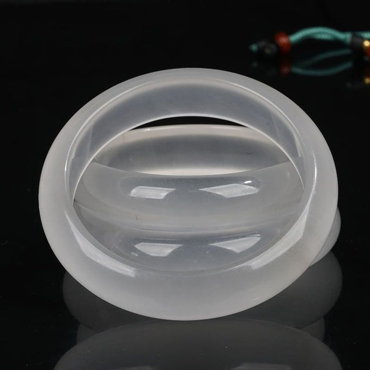 Pulsera de la suerte de la riqueza del jade de seda dorada translúcida natural de las Buddha Stones