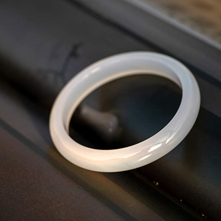 Brazalete de pulsera positiva de armonía de calcedonia natural con Buddha Stones