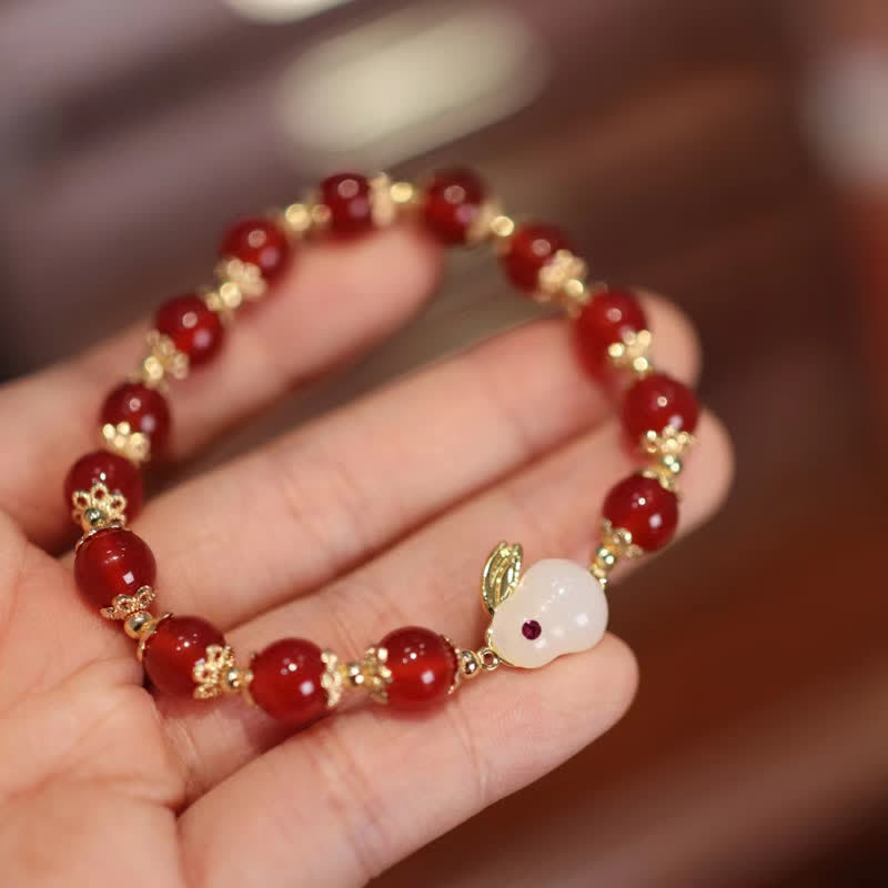 Pulsera de confianza de jade blanco y ágata roja natural del año del conejo