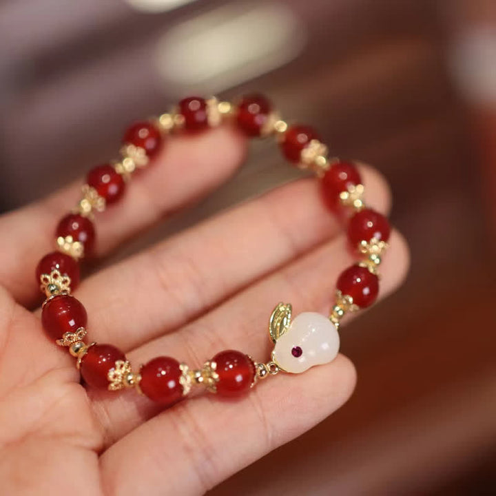 Pulsera de confianza de jade blanco y ágata roja natural del año del conejo