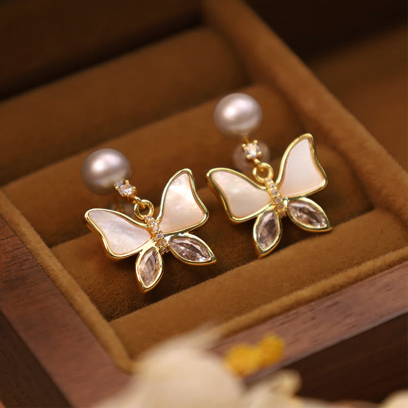 Pendientes de tuerca de sinceridad de mariposa con perlas de concha natural de cobre chapado en oro de 18 quilates con Buddha Stones