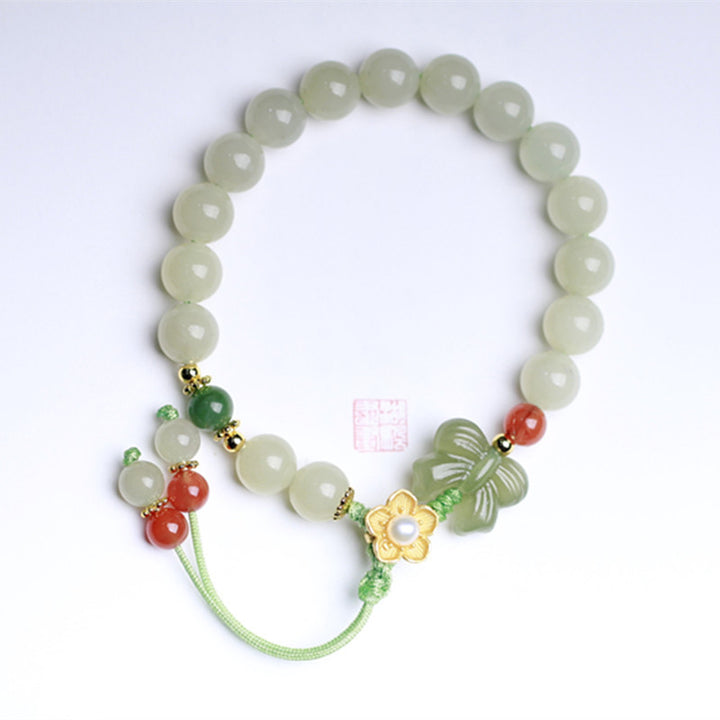 Pulsera de mariposa y flor de la suerte de jade de plata de ley 925 con Buddha Stones