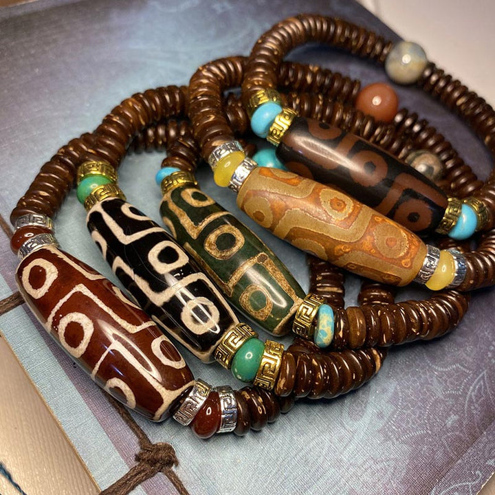 Pulsera de riqueza de cuentas Dzi tibetanas de nueve ojos con Buddha Stones