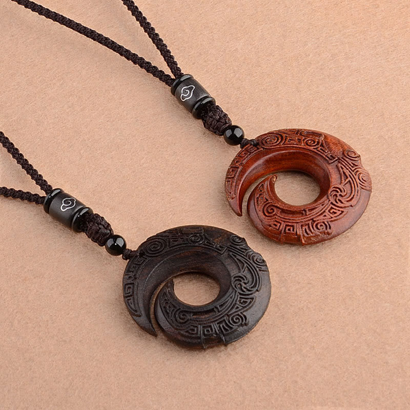 Buddha Stones, hoja pequeña, sándalo rojo, madera de ébano, la suerte mejora el diseño, colgante de collar de protección