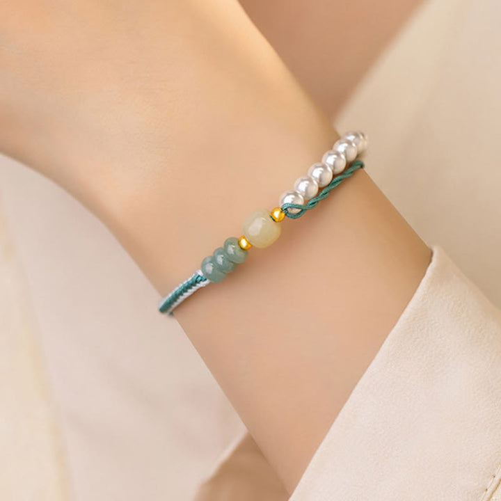 Pulsera de abundancia de perlas de cuerda trenzada de jade hetiano de plata de ley 925 con Buddha Stones