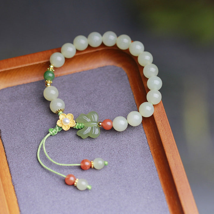 Pulsera de mariposa y flor de la suerte de jade de plata de ley 925 con Buddha Stones