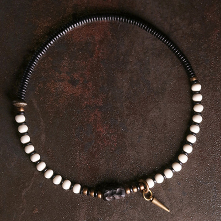 Pulsera de pareja con Buddha Stones, cuentas de hueso, madera de ébano y cobre.