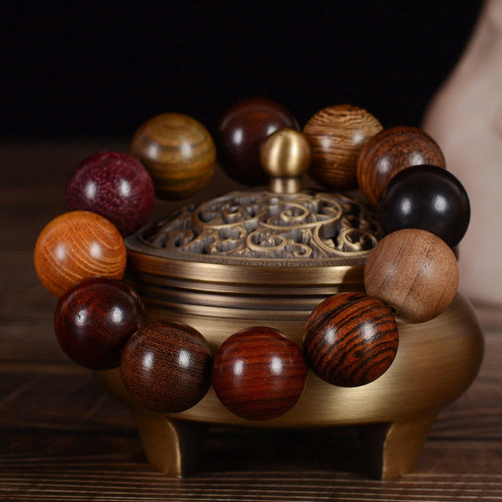 Pulsera curativa de protección de sándalo multicolor con Buddha Stones