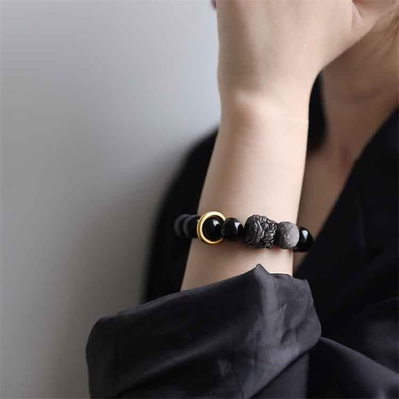 Pulsera de fuerza de león de obsidiana con brillo plateado de obsidiana negra