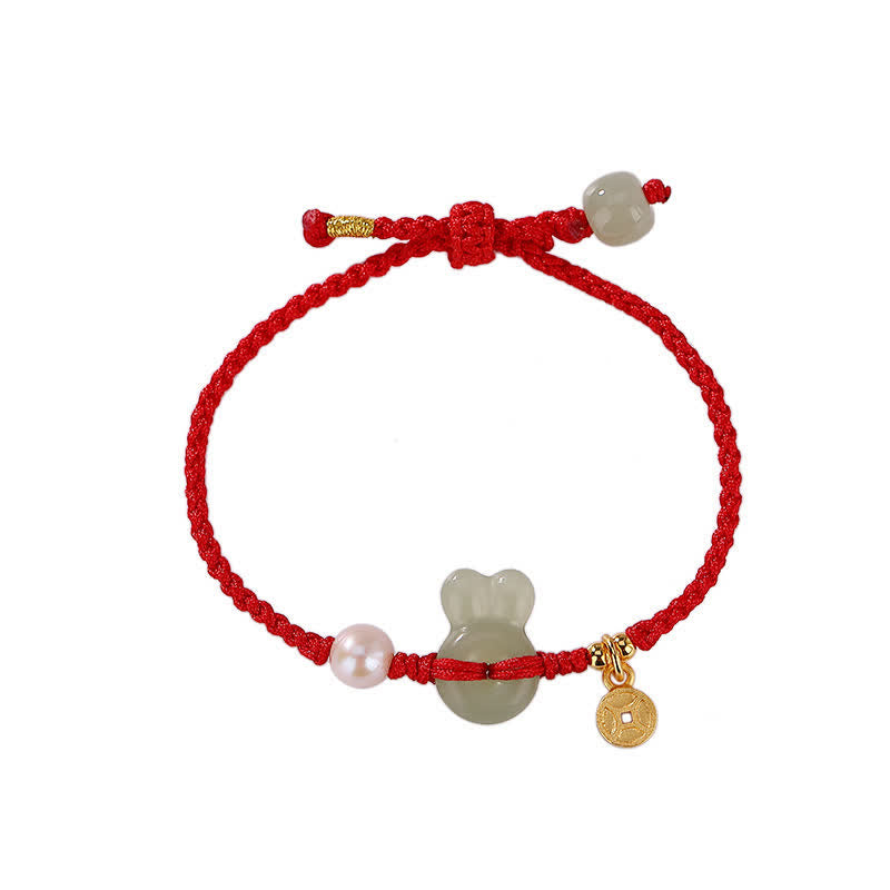 Pulsera de hilo rojo con moneda de cobre y jade hetiano del año del conejo en plata de ley 925