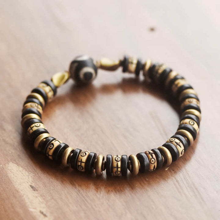 Pulsera de fuerza de madera de ébano con cuentas de hueso tibetano y piedras de Buddha Stones