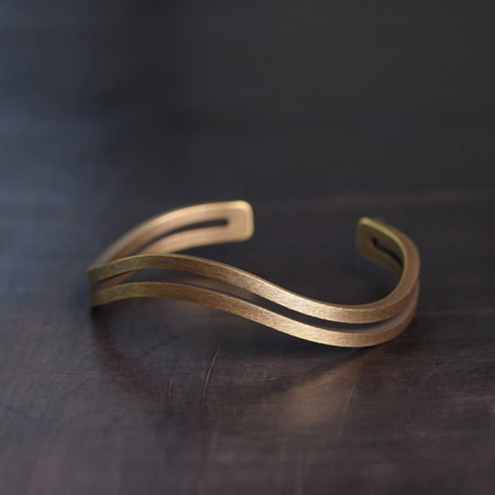 Pulsera vikinga de la suerte de cobre rústico con Buddha Stones