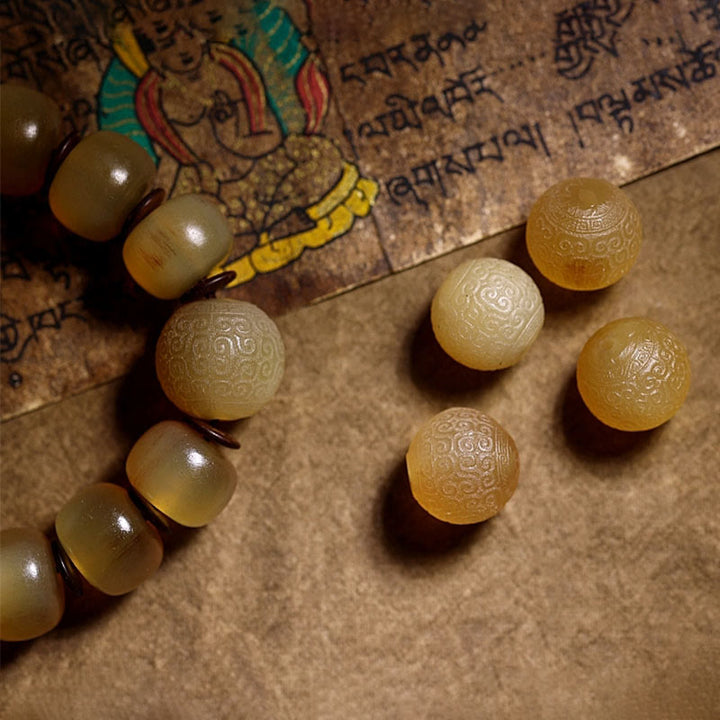 Pulsera auspiciosa hecha a mano con Buddha Stones , cuerno de oveja tibetano, Om Mani Padme Hum