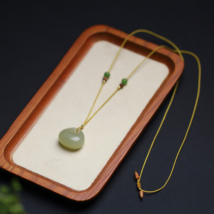 Colgante de collar de cadena de prosperidad con patrón de bolsa pequeña de jade hetiano natural