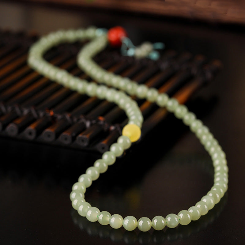 Pulsera de prosperidad de Buda sonriente de ámbar y ágata roja de jade