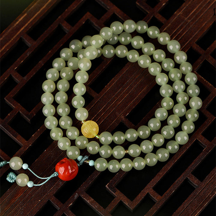 Pulsera de prosperidad de Buda sonriente de ámbar y ágata roja de jade