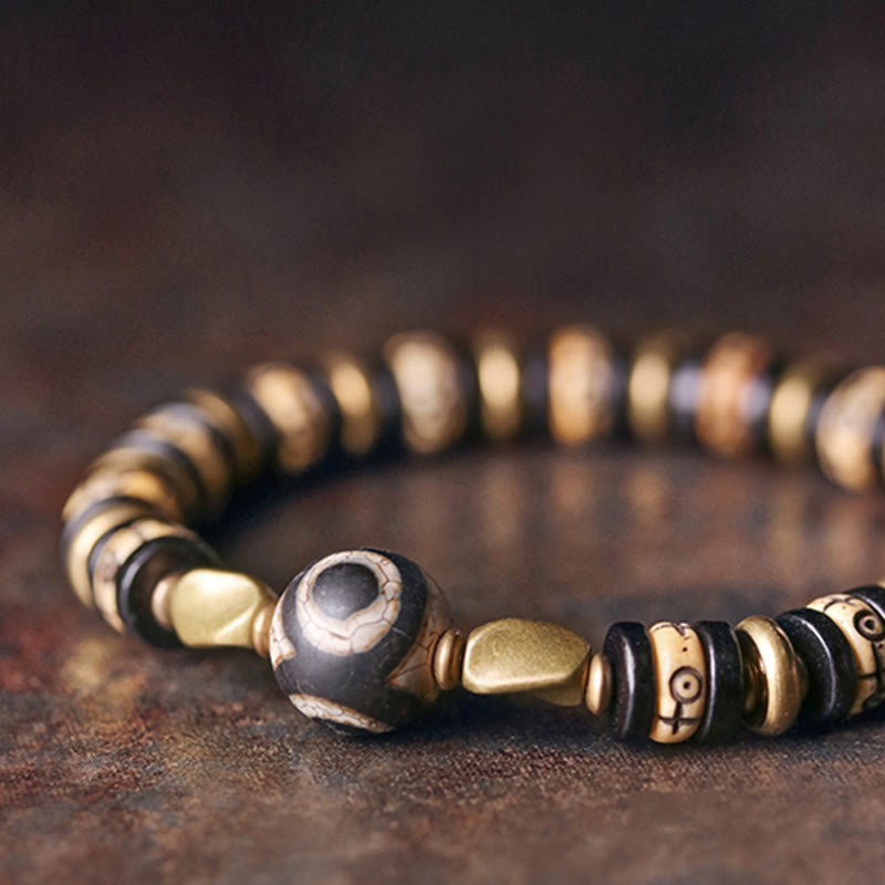 Pulsera de fuerza de madera de ébano con cuentas de hueso tibetano y piedras de Buddha Stones