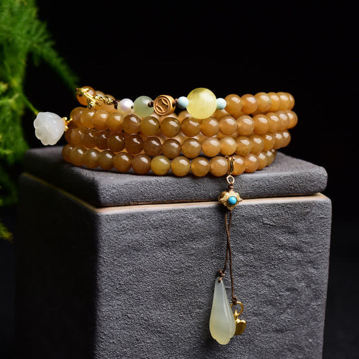 Pulsera de éxito de perlas de jade blanco de loto ámbar de topacio hetiano natural