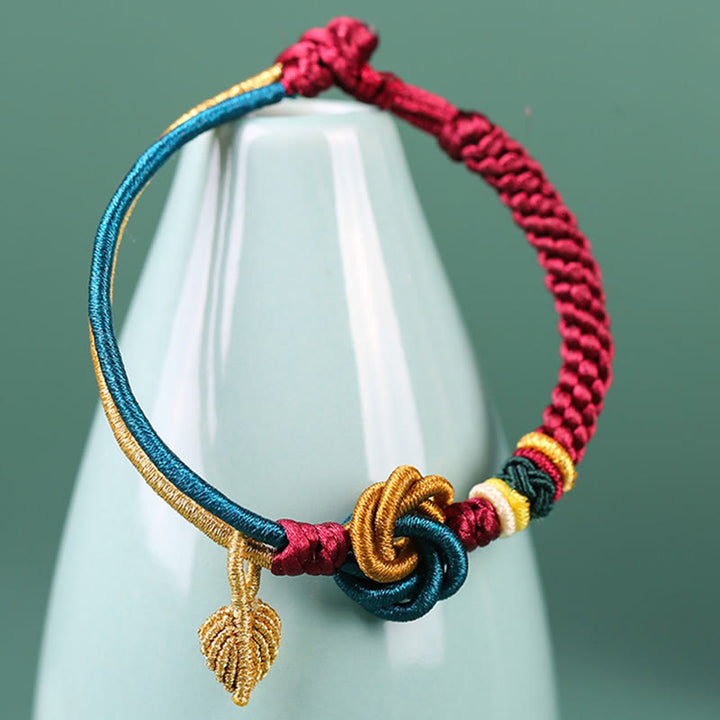 Pulsera de cuerda de la suerte con nudo de mandala hecha a mano tibetana con Buddha Stones