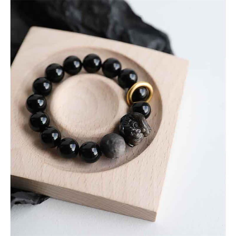 Pulsera de fuerza de león de obsidiana con brillo plateado de obsidiana negra