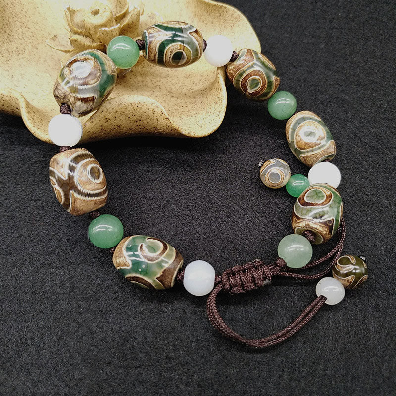 Pulsera trenzada de protección de la suerte con cuentas Dzi tibetanas de tres ojos con Buddha Stones