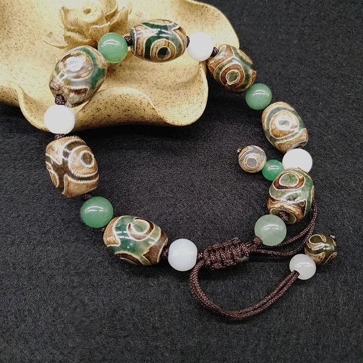 Pulsera trenzada de protección de la suerte con cuentas Dzi tibetanas de tres ojos con Buddha Stones