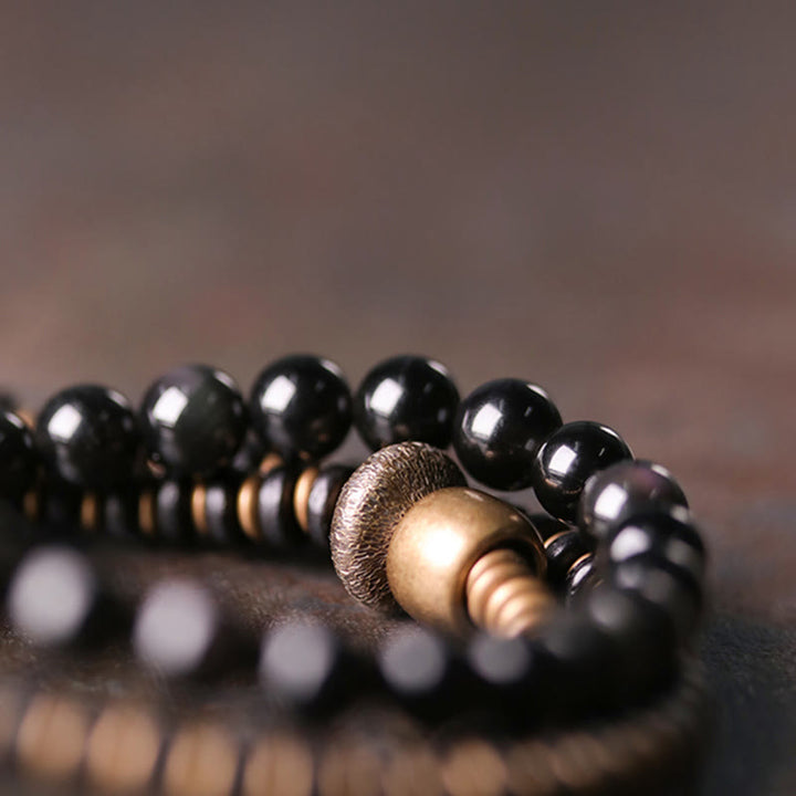 Pulsera de triple envoltura curativa de cobre y madera de ébano, obsidiana arcoíris con Buddha Stones