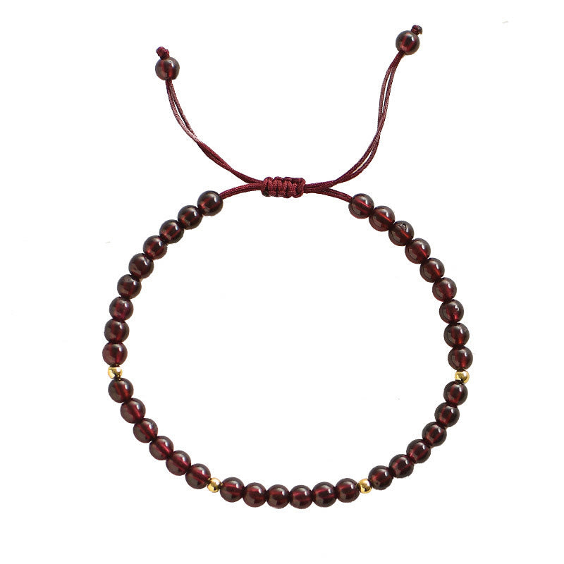 Pulsera de estabilidad con cuentas doradas y granate natural con Buddha Stones