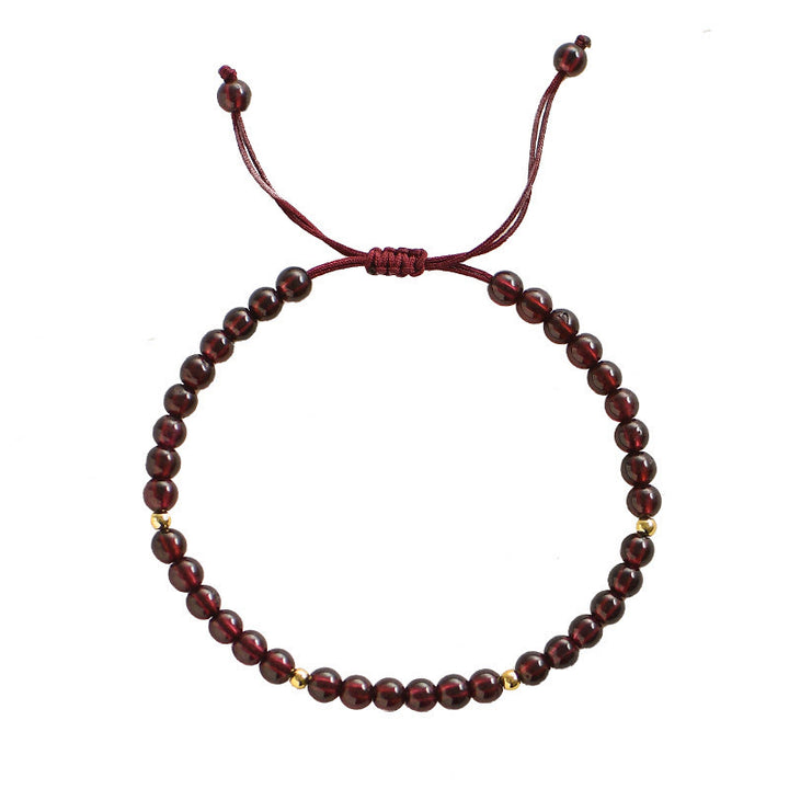 Pulsera de estabilidad con cuentas doradas y granate natural con Buddha Stones