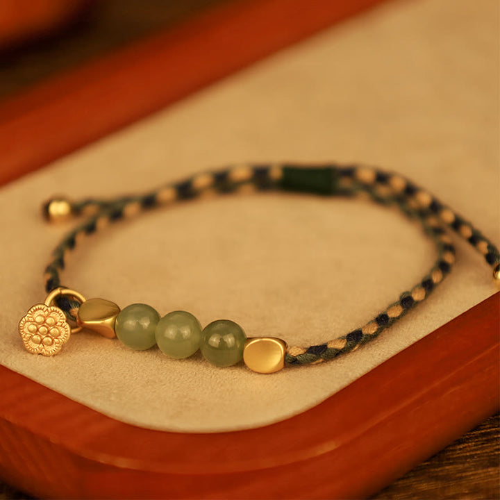 Pulsera trenzada de la suerte con dije de loto de jade hetiano hecho a mano con Buddha Stones
