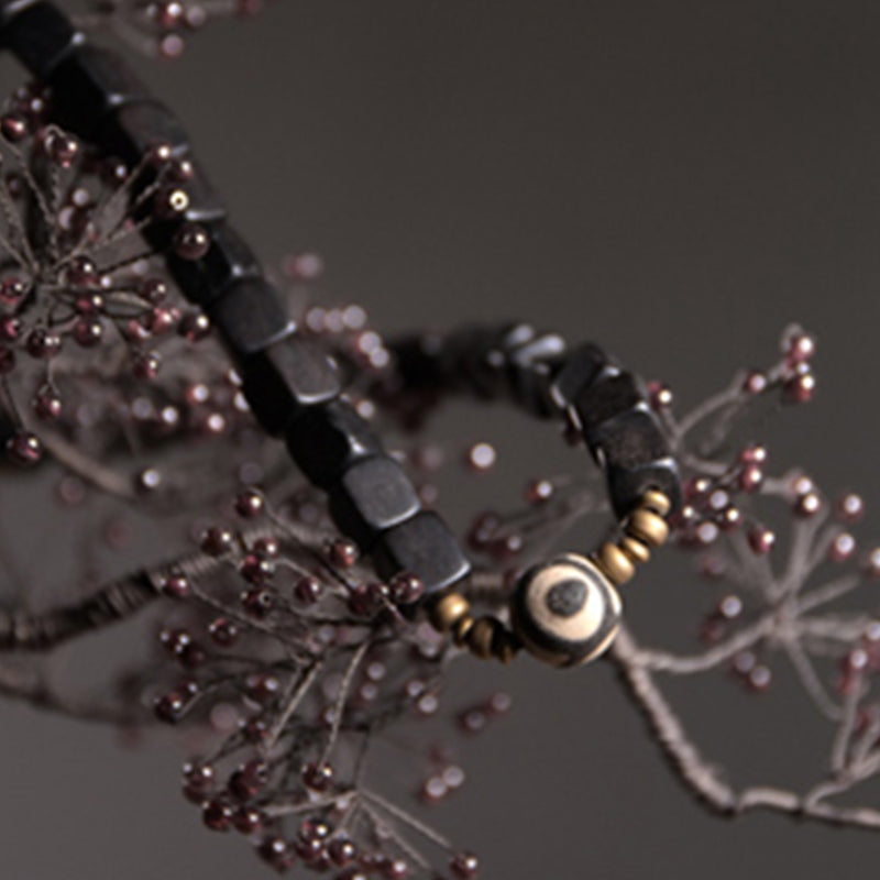 Pulsera de pareja de paz de cobre con cuentas Dzi de madera de ébano