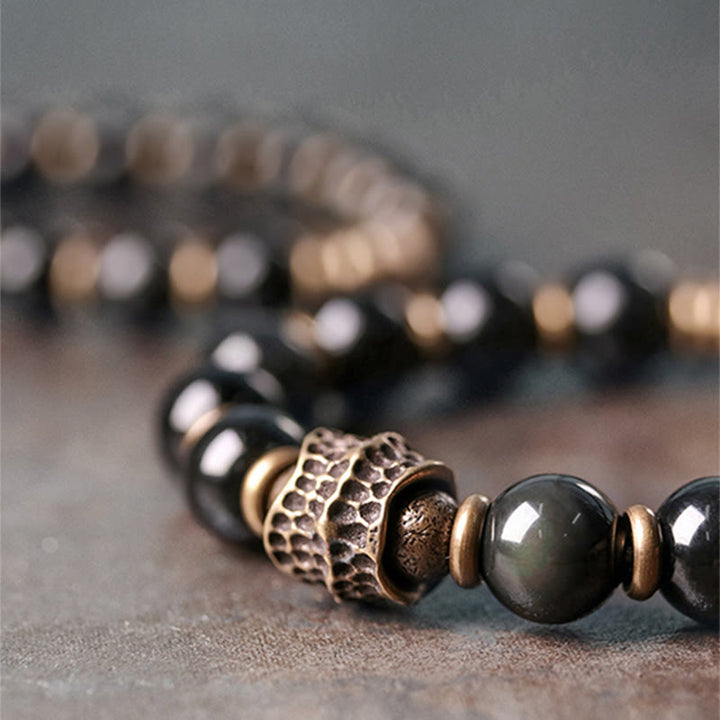Pulsera curativa de amor de cobre y obsidiana arcoíris con Buddha Stones