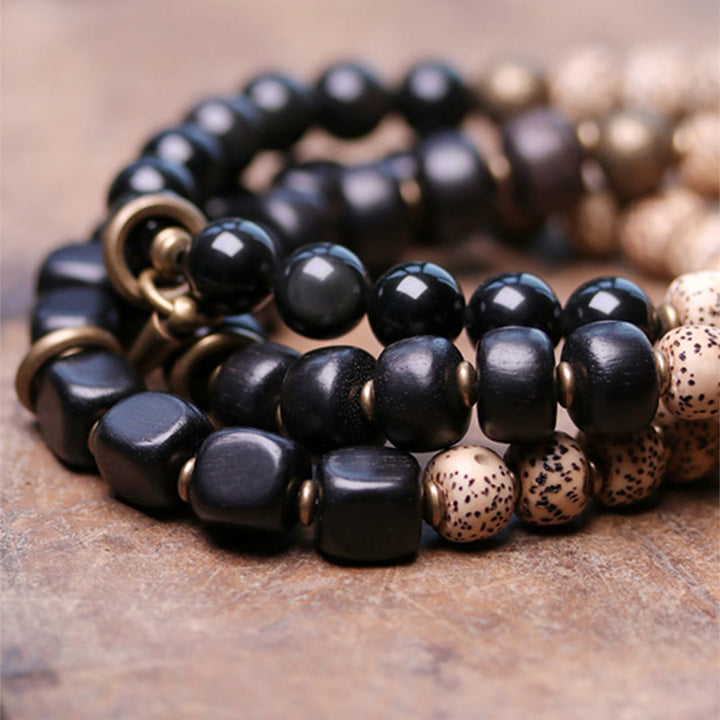 Pulsera de paz de cobre y madera de ébano, obsidiana negra, semilla de Bodhi tibetana, Buddha Stones