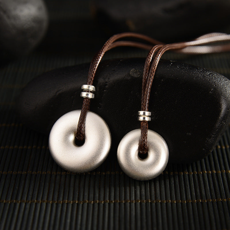 Colgante de collar de protección con hebilla de paz redonda de plata de ley 999 con Buddha Stones