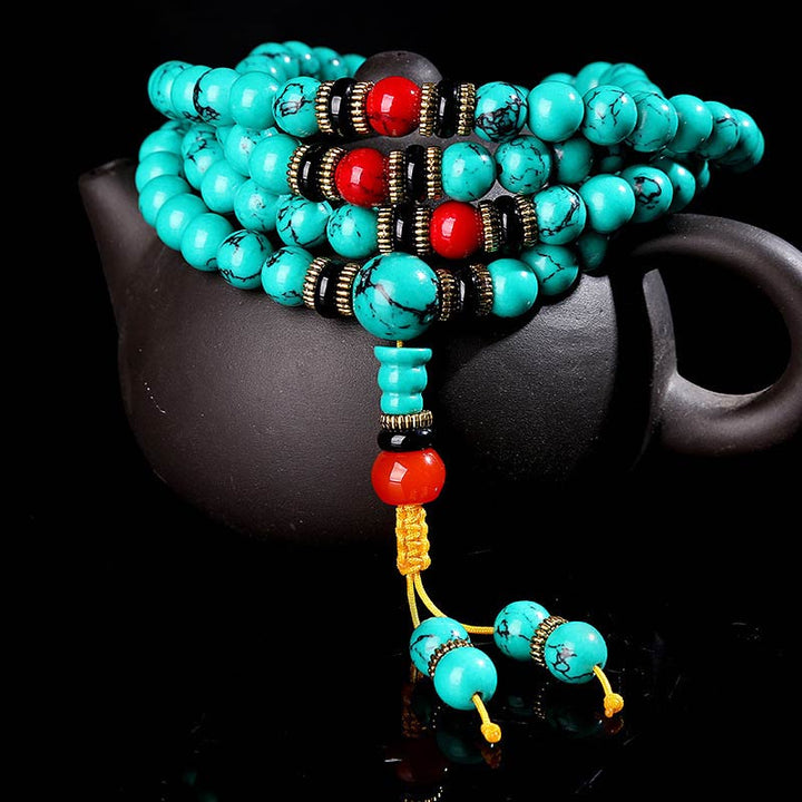 Pulsera Mala curativa de turquesa tibetana con Buddha Stones