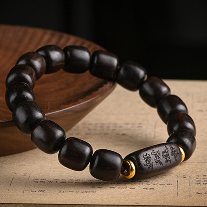 Pulsera de equilibrio de la suerte y el tesoro, cuentas de barril de madera de ébano tibetano, Buddha Stones