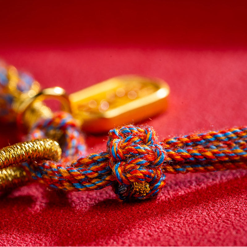 Pulsera trenzada con dije auspicioso de Om Mani Padme Hum tibetano multicolor hecho a mano con Buddha Stones