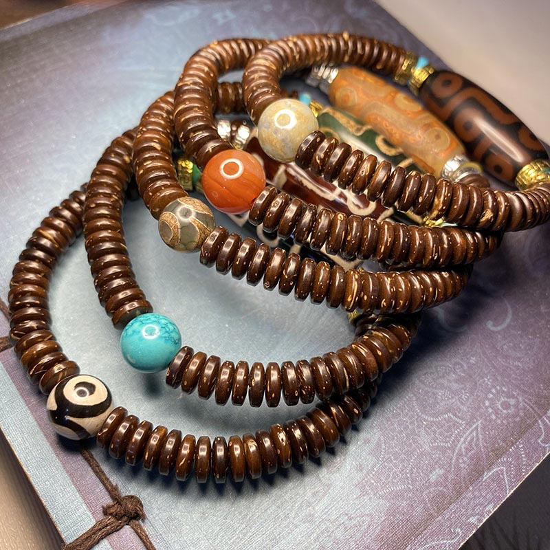 Pulsera de riqueza de cuentas Dzi tibetanas de nueve ojos con Buddha Stones