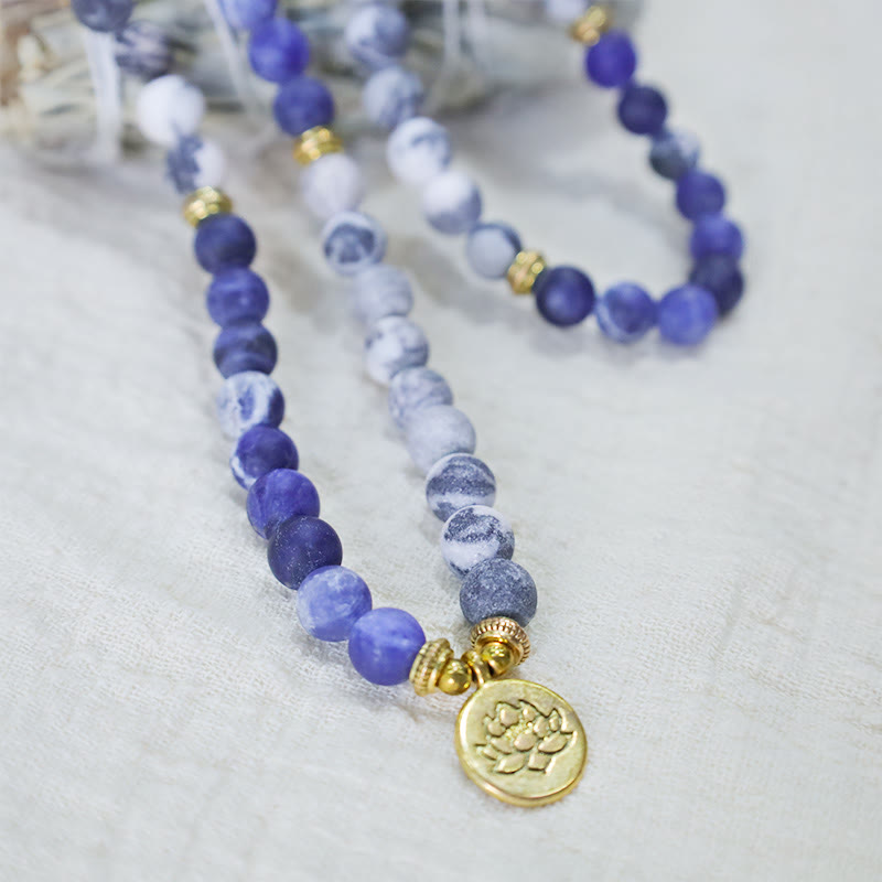 Pulsera con colgante de loto con cuentas de Mala de piedra azul y jaspe Picasso Natural 108 de Buddha Stones