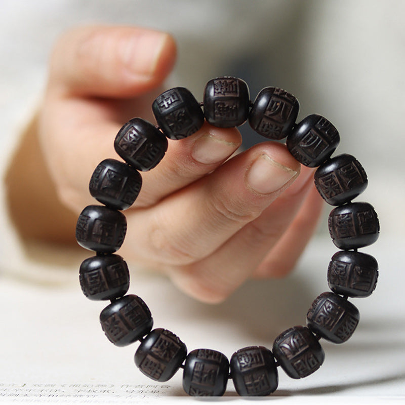 Pulsera de equilibrio grabada con Buddha Stones , madera de ébano del Tíbet, Om Mani Padme Hum