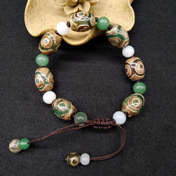 Pulsera trenzada de protección de la suerte con cuentas Dzi tibetanas de tres ojos con Buddha Stones