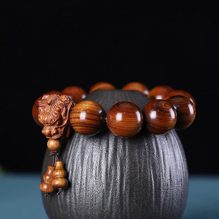 Pulsera de protección con Buddha Stones, palisandro, sándalo verde, hoja pequeña de sándalo rojo y dragón tallado
