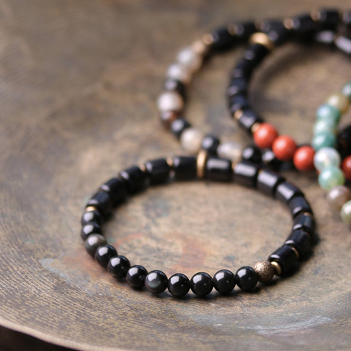 Pulsera de pareja de paz con Buddha Stones, madera de ébano, jaspe rojo, ágata de musgo, cristal, cobre