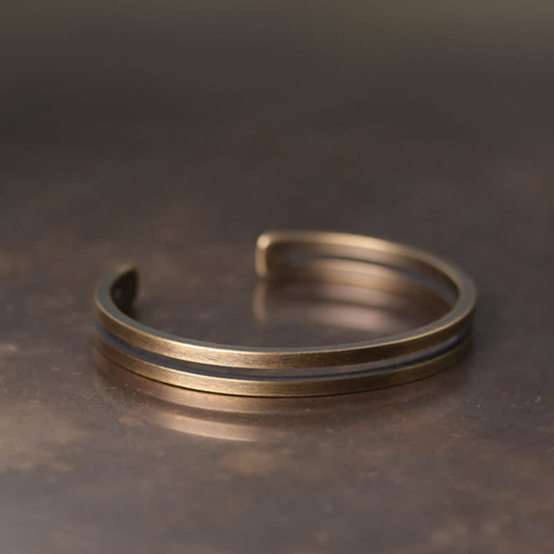 Pulsera vikinga de la suerte de cobre rústico con Buddha Stones