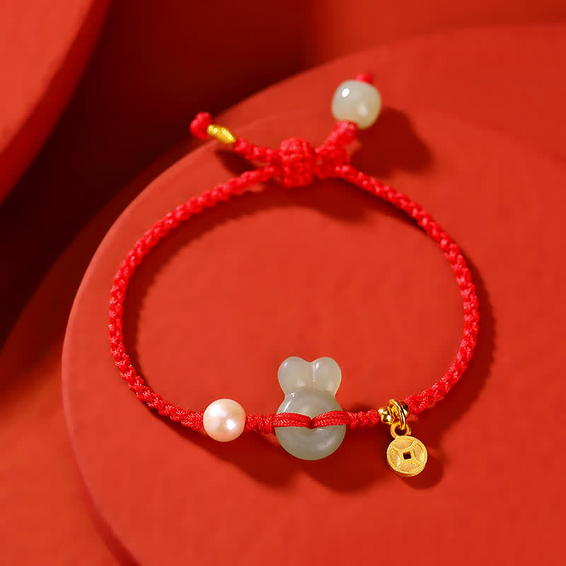 Pulsera de hilo rojo con moneda de cobre y jade hetiano del año del conejo en plata de ley 925