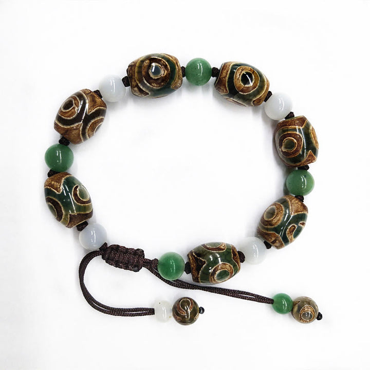 Pulsera trenzada de protección de la suerte con cuentas Dzi tibetanas de tres ojos con Buddha Stones